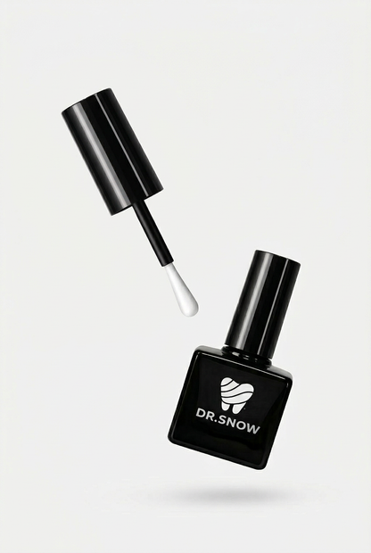 Teeth polish bottle with applicator on a white background, featuring the brand 'DR. SNOW'.